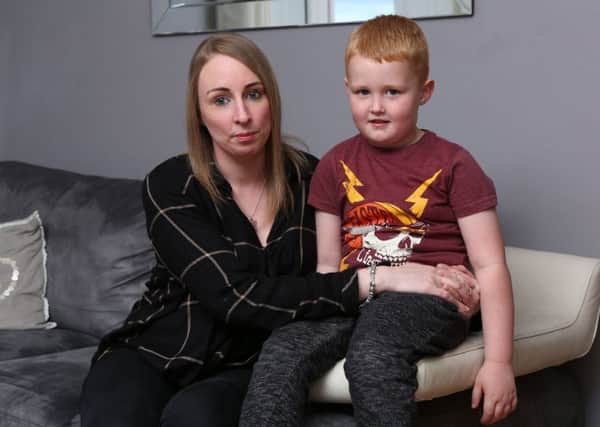 Kimberley Ramsay and her son Calvin (5), who was rescued by a stranger after walking out the grounds of Valley PS last week. Pic: David Cruckshank.s