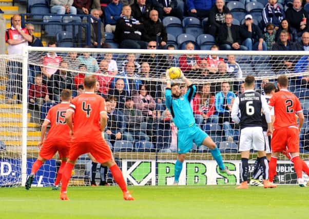 Aaron Lennox makes a save against St Mirren last season. Pic: Fife Photo Agency