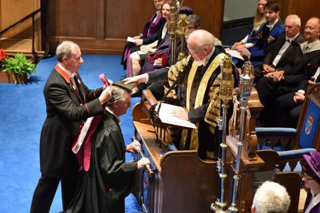 Michael Palin receives his honorary degree. (Picture: University of St Andrews)