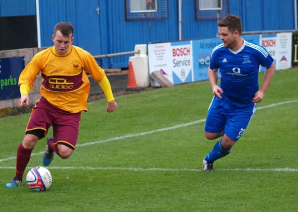 St Andrews boss Craig Morrison, playing here in blue, hopes to strengthen the St Andrews Utd attack (picture by Blair Smith).