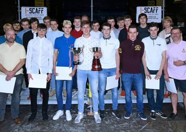 Kirkcaldy Ice Hockey Club's U20 squad with its silverware (picture by Andrew Lee)