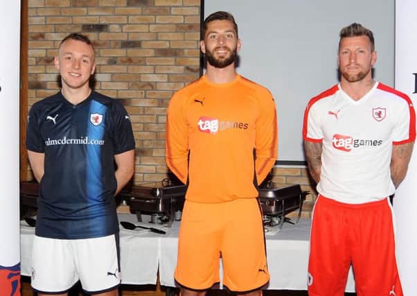 Kit parade ... Raith Rovers' new strip launch at Society. From left, Greig Spence, Aaron Lennox and Iain Davidson (picture by Fife Photo Agency).