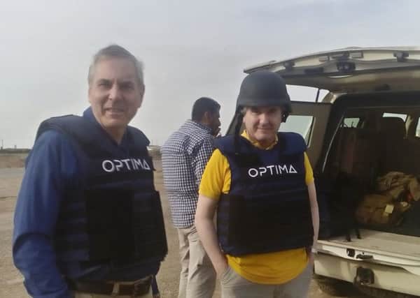 Roger Mullin with security personnel from Optima during his visit to Iraq