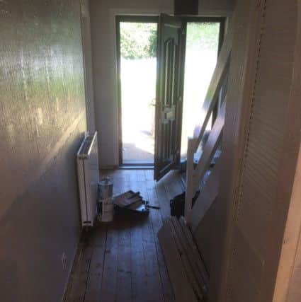 Laminate flooring and skirting boards were removed by forensic officers in the hallway of the Barnton Place property. (Pic Neil Henderson FFP).