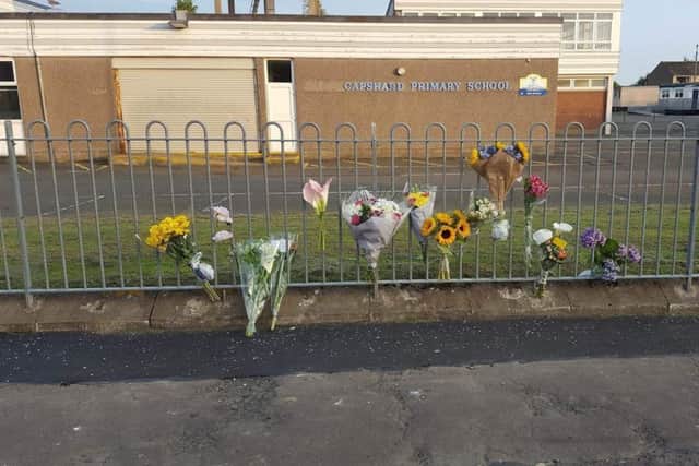 Floral tributes outside the primary school