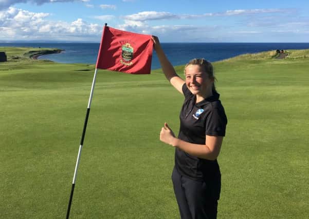 Anna McKay broke her own record when she competed in the junior medal over Balcomie Links.