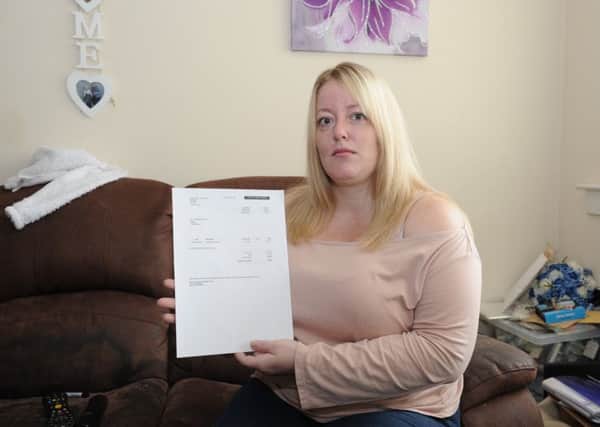 Bride-to-be Jackie Waugh has had to pay a further Â£600 on top of the Â£1100 cost to receive her wedding dress. (Pic: George McLuskie).