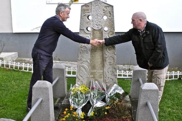 Velibor Vidic (left) with Alan Cumming at the grave of Evelina Haverfield, a WW1 nurse in Serbia in Elsies unit.
