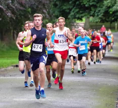 Fife AC juniors Ben Kinninmonth (474) and Craig Morris (434) make the early running at the Beveridge Park 5km.