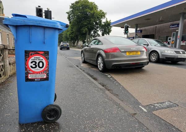 The 30 mph posters have been stuck on bins around Dairsie. (Pic: Dave Scott)