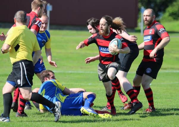 Niall Hutchison makes one of his many breaks forward as Waid ease past BoÂ’ness. Pic by Rob S Photography.