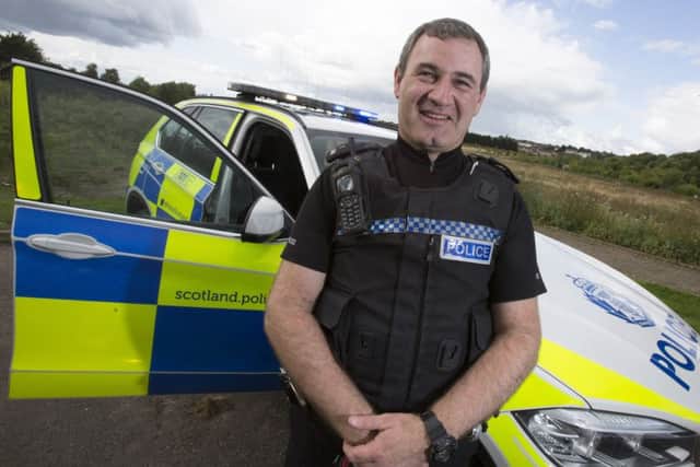 Proud dad...Malcolm Armstrong is now a dad of five with everything to live for. A police constable, he had a successful kidney transplant in June 2005 while still a probationary officer.