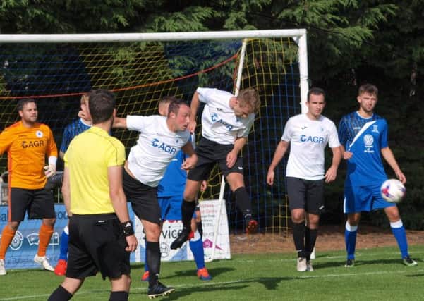The Musselburgh defence sees off another Saints attack. Picture by Blair Smith.
