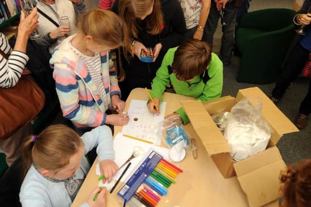 Youngsters take part in badge making