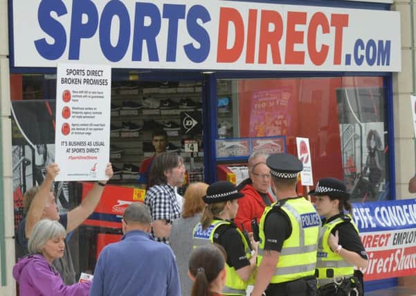 Campaigners descended on the Sports Direct store earlier today. (Pic George McLuskie).