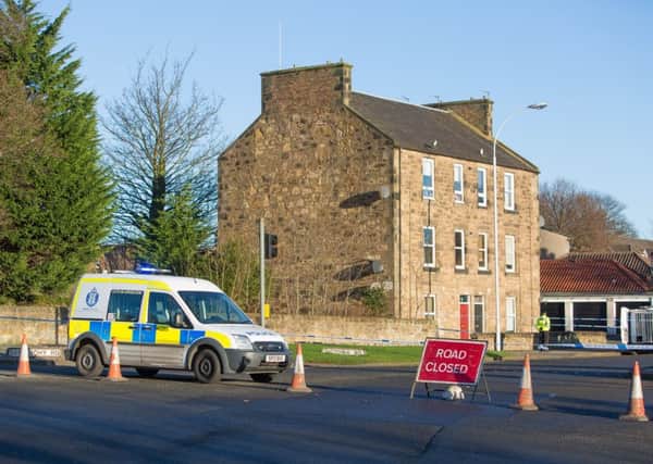 Police closed off part of Victoria Road in January after the incident. Picture: Steven Brown