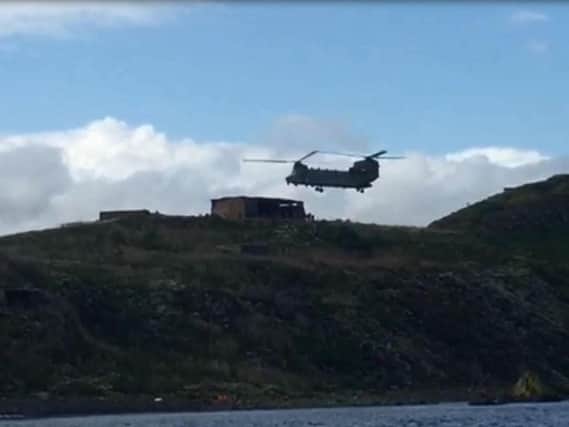 A Chinook lands on Inchkeith