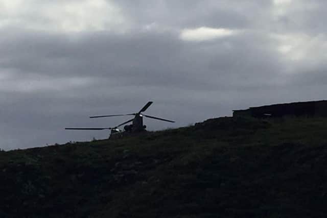 the Chinook landing on the island