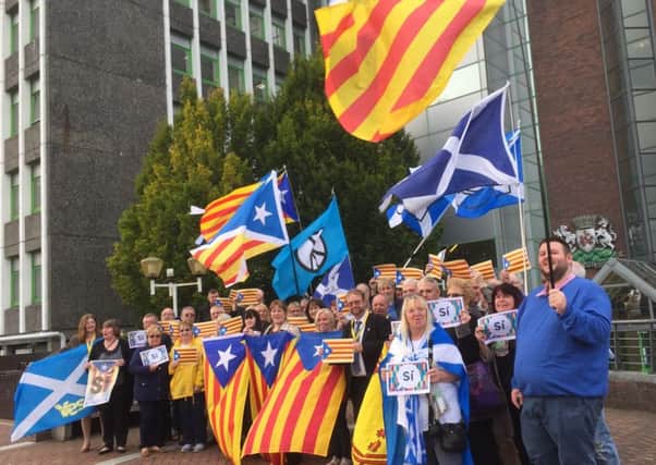 Around 50 people gathered outside Fife House on Wednesday evening in a show of support.