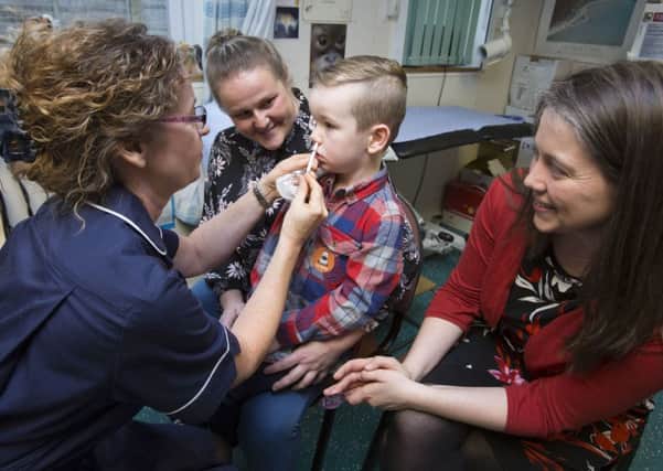 Public Health Minister Aileen Campbell today joined four-year- old Lyle Findlay at his vaccination appointment. Pic: Mark F Gibson.