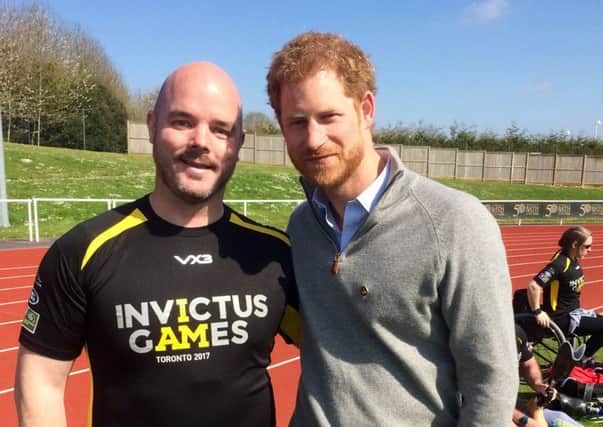 Michael Mellon meets Prince Harry, who founded the Invictus Games.