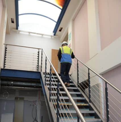 Stairwell leading to upstairs functions rooms and other facilities.