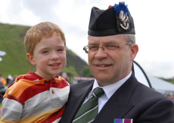 The SSAFA helps  veterans like  Glen Lawson, pictured with grandson Finn.