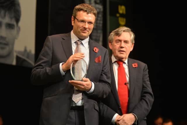 Gregor Mitchell accepts the inductee award from Gordon Brown on behalf of the late George McLay (Pic: George McLuskie)