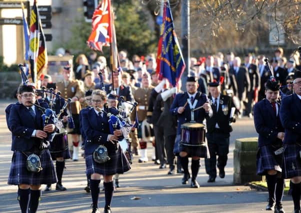 Kirkcaldy Pipe Band led the parade to Kirkcaldy War Memorial. Pic: Fife Photo Agency.
