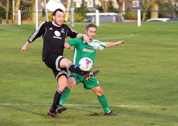 Scott Mayne clears his lines as Thornton threaten at the weekend. Picture by George Wallace.