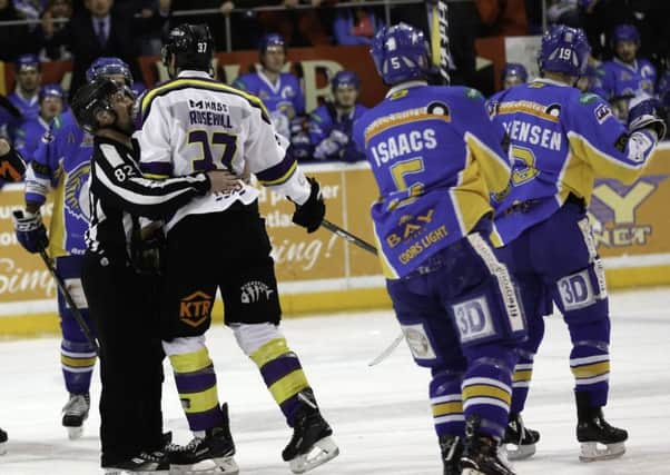 Jay Rosehill, Manchester Storm, restarined by an official after his outburst in the Ne'er game versus Fife Flyers which led to a six-game ban (Pic: Steve Gunn)