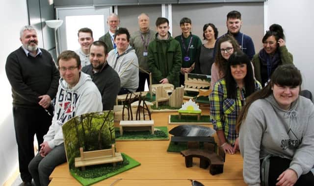 Fife College furniture students pictured with their individual designs along with Jill Aiken and John Fraser from the Woodland Trust and John Wincott and Ron Eldridge from Fife College.