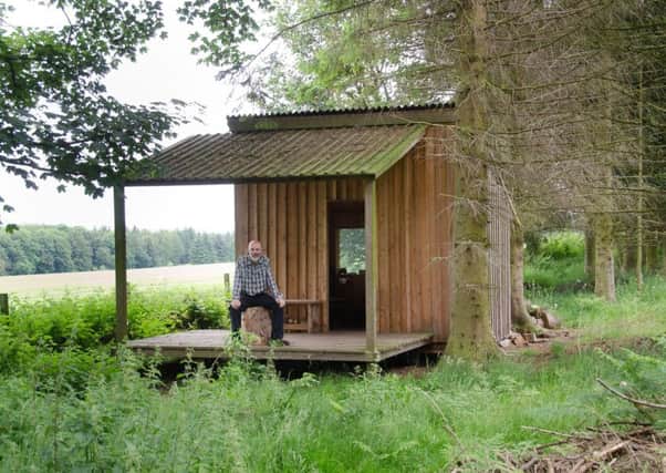 Ninian and his hut.