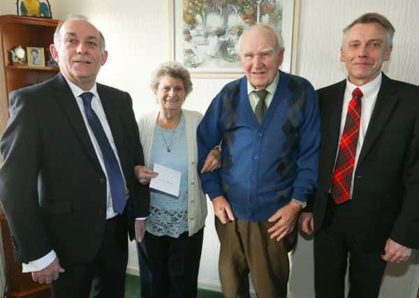 Alexander and Margaret Beveridge are pictured with 
Councillor Ian Cameron and Jim Kinloch, Depute Lieutenant.


Picture: Andrew Beveridge.