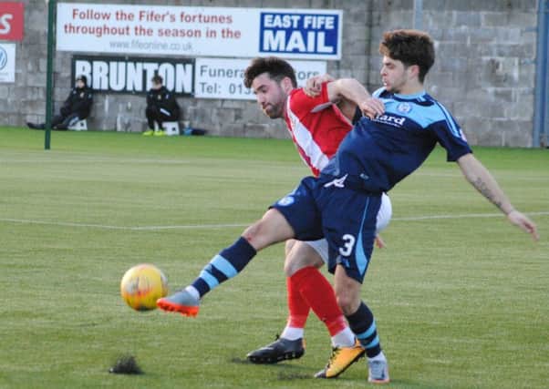 Chris Duggan battles to win back the ball against Forfar. Pic by Kenny Mackay.