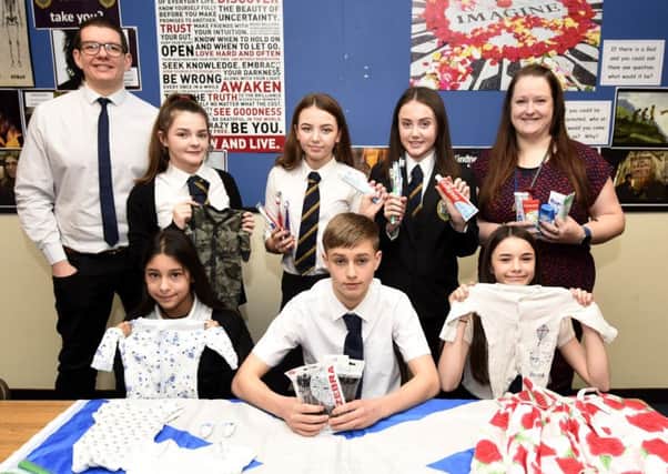 Staff and pupils have been collecting donations for projects in Rwanda. Pic: Fife Photo Agency.