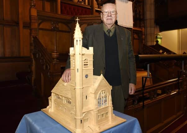 David Todd with his matchstick model of Erskine Church. Pic: FPA