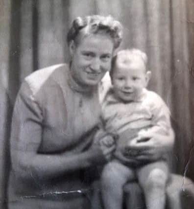 Davie Garrity his mum Elizabeth Ramsey holding him as a baby.