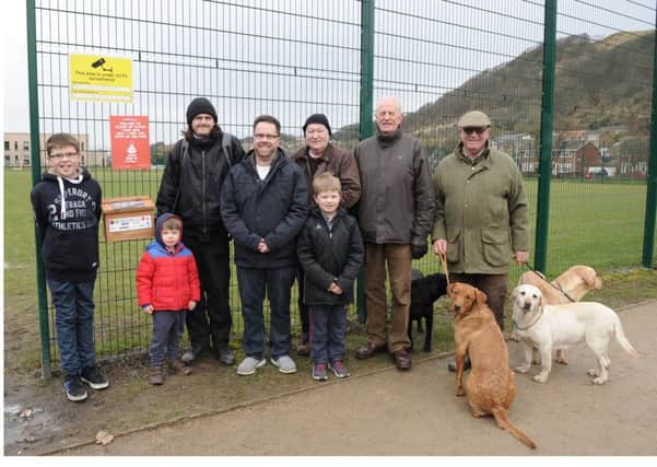 Scott Sweaton and his sons Lochlan (12), Reid (7) and Connal (4) with John Bruce, Andy Smith and Gordon McLauchlan from the community council and Ben Barron from the Burntisland Community Devlopment Trust, campaigning for cleaner streets. Pics by George McLuskie.