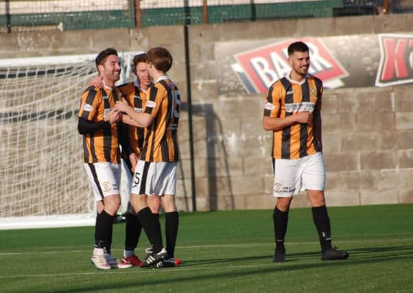 The Fifers celebrate after Chris Duggan's winner at the weekend. Picture by Kenny Mackay.