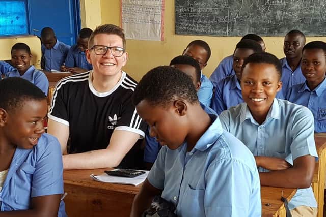 Barry Mitchell with the youngsters in Rwanda.