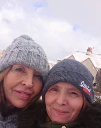 Home carers Jane Campbell and Lynn Morrison struggled through the snow to get to work