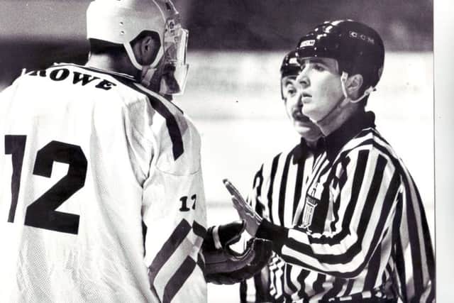 Great archive pic of Fife Flyers defenceman Mike Rowe in debate with the stripeys 1989-90 (Pic: Bill Dickman)