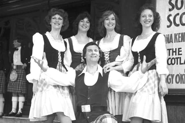 Scottish entertainer Peter Morrison in tartan trews with some of the dancers from his show "Songs of Scotland' playing at the King's theatre in Edinburgh in May 1980.