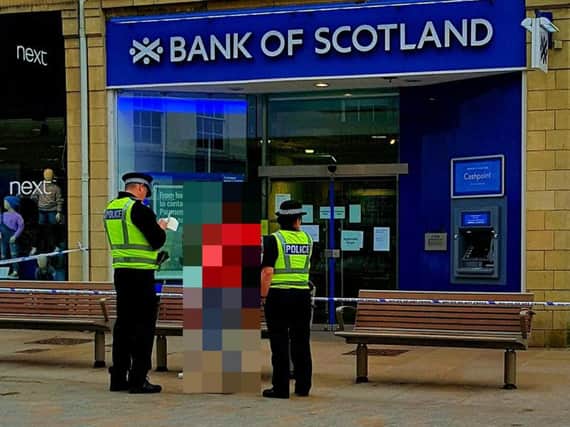 Police are investigating and the bank has been sealed off.