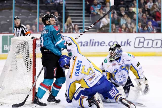 David Rutherford, Belfast Giants, with Fife Flyers James Isaacs and Jordan Marr  (Pic:  William Cherry/Presseye

)