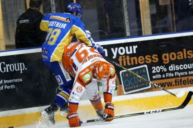 Dannick Gauthier on the boards for Fife Flyers versus Sheffield Steelers (Pic: Steve Gunn)