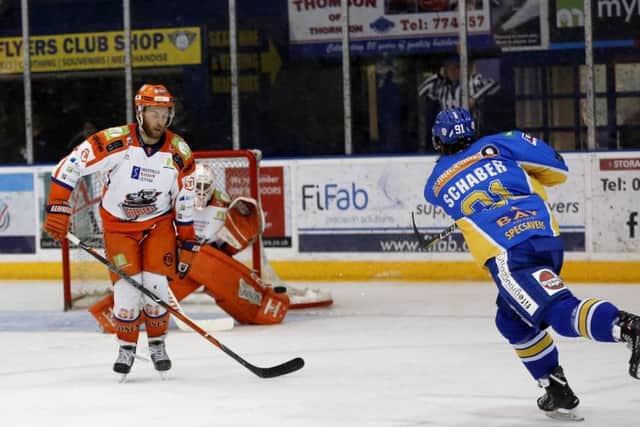 Chase Schaber shoots for goal in the match between Fife Flyers and Sheffield Steelers (Pic: Steve Gunn)