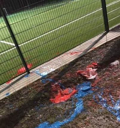 Paint was also thrown over the fence and artificial grass. Pic: Cardenden Community Council.