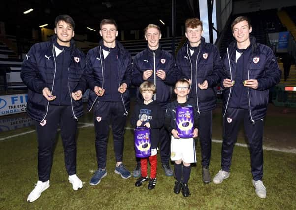 Raith Rovers U20 players promote the Kids for a Quid Easter promotion with Tuesday night's mascots Jay Anthony and Declan ODuibhinn. Pic: Fife Photo Agency
